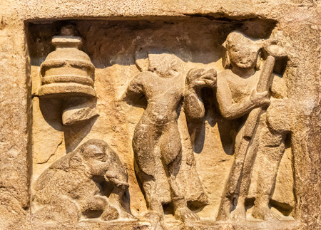 ruined stone relief illustrating buddhist teachingsの写真素材