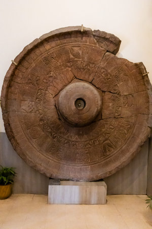 holy broken stone umbrella from history at indoor exhibit