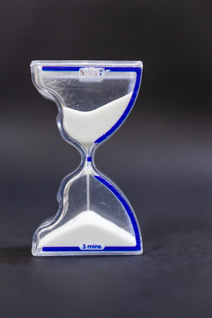 Transparent Sand Time Management Tool On Black Background
