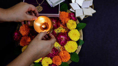 Hands Lighting Oil Lamp For Hindu diwali Festival Worship