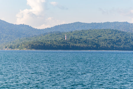 scenic view of the andaman islands with lighthouse on a tropical island hillの写真素材