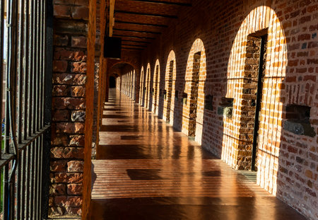 colonial cellular jail kala pani historic corridor architecture lit with sunlight image is taken at the Cellular (Kala Pani) Jail, Andaman Nicobar Islands, India.の写真素材