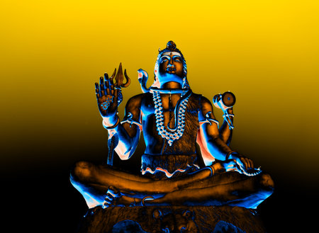 dramatic statue of hindu almighty lord shiva with colorful lightsの写真素材
