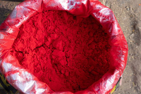 colorful festival pigment powder for holi celebration in street marketの写真素材