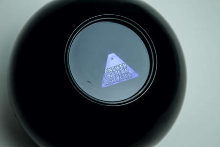 Black prediction ball for decision making. Answer unclear, ask laterの写真素材