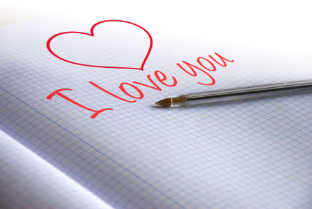 Red Heart written with penの写真素材