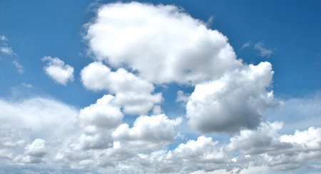 sky landscape formed by clusters of white clouds
