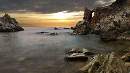 Dawn along the sea shore in the autumn in the costa Brava