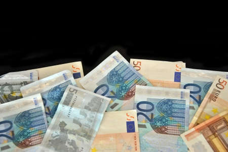 various Euro notes on a black tableの写真素材