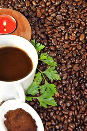 cup of coffee on various coffee beansの写真素材