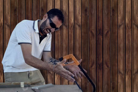 Carpenter crazy in shock with their workの写真素材