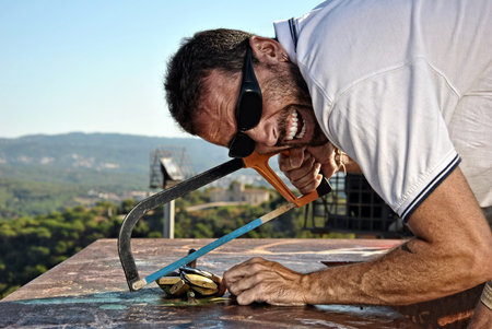 Carpenter crazy in shock with their workの写真素材