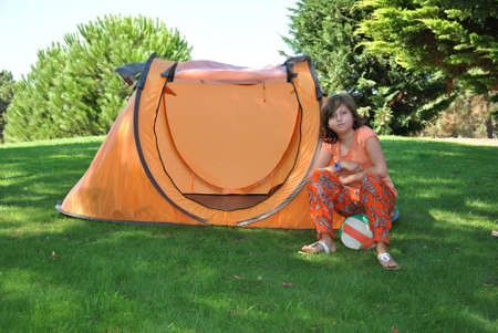 girl with balloon on a spring campingの写真素材