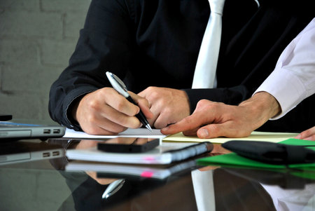 businessmen in his office planning the day