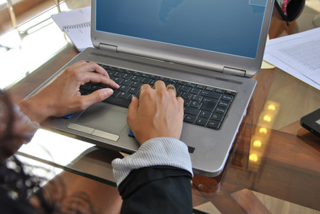 clerk in his office working with your computer
