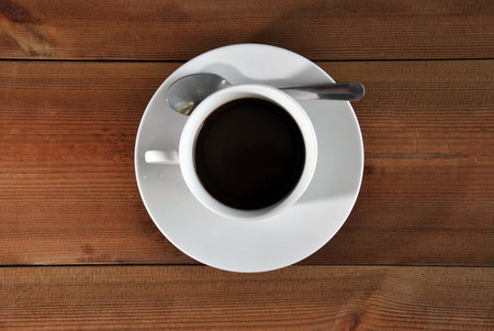 cup of coffee on a wooden table