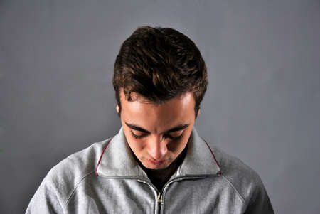 portrait of young man with a face of concernの写真素材