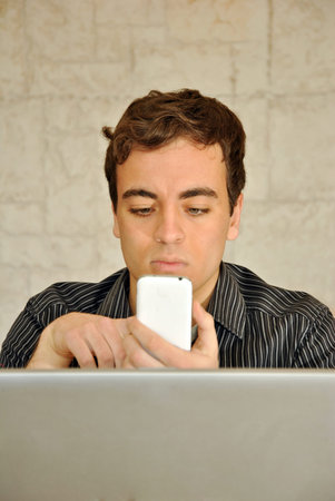 young guy getting facial expressions in his office