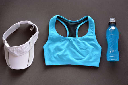 clothing women's fitness with drink energy and mobile phoneの写真素材