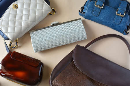WOMAN COMPLEMENTS, COMPOSED OF HANDBAGS, MAKEUP, SUNGLASSES AND JEWELRYの写真素材