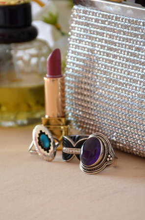 WOMAN COMPLEMENTS, COMPOSED OF HANDBAGS, MAKEUP, SUNGLASSES AND JEWELRYの写真素材