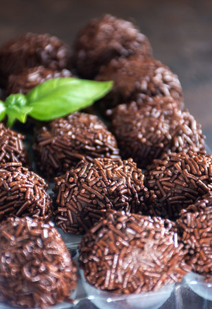 Truffles chocolate made in home, on board it rustic
