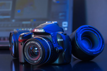 Studio Photography with computers, cameras, flashes and multiple lens