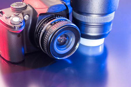 Studio Photography with computers, cameras, flashes and multiple lens