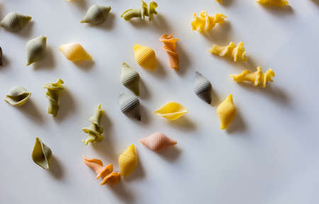 Typical Italian conchiglie pasta accompanied by macaroonsの写真素材