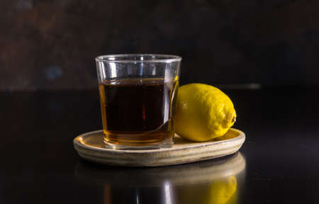 two different glasses of tequila, one is stale and the other white. typical Mexican drinkの写真素材