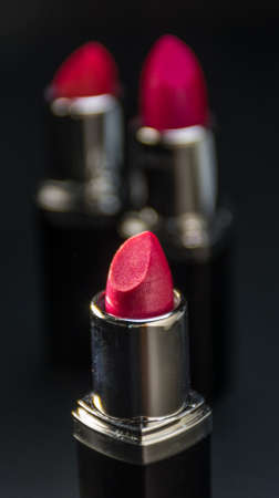 Several lipstick in different colors with special lightingの写真素材