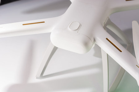 Drone with built-in camera that records to 4k, on white and black background