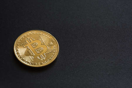 cryptocurrency called bitcoin on black backgroundの写真素材