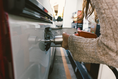 Ecological car that runs on natural gas. Hose to refuel the ecological vehicle