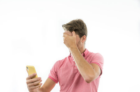 Man with different emotions when making bets on mobile phone