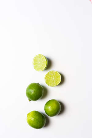 Lime cut to prepare a Mojito cocktail with mintの写真素材