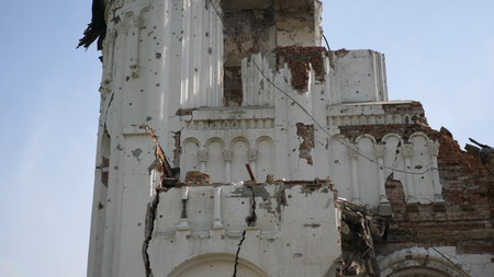 View to destroyed church at Kharkivska oblast. Ruined building after bomb attacks on ukrainian territory from russia army. Consequences of russian invasion of Ukraine. Slow motionの写真素材