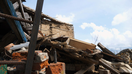 View to destroyed residential buildings at Kharkivska oblast. Ruined houses after bomb attacks on ukrainian territory from russia army. Consequences of russian invasion of Ukraine. Slow motionの写真素材