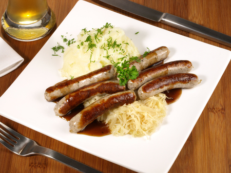 German Sausages with Sauerkraut and mashed Potatoesの写真素材