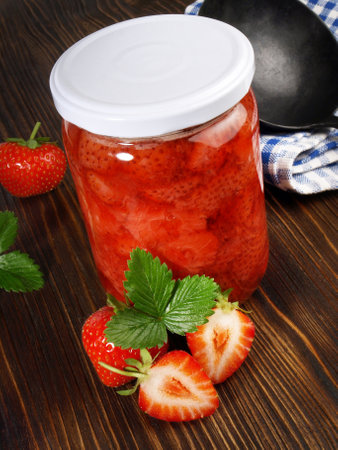 Strawberry Jam on wooden backgroundの写真素材