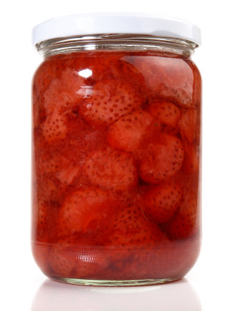 Strawberry Jam in a Glass on white backgroundの写真素材