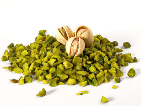 Chopped Pistachios on white background - Isolatedの写真素材