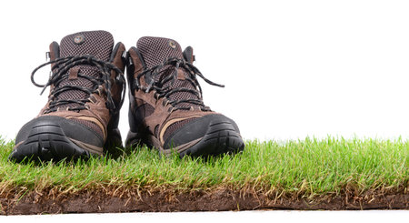 Hiking Shoes on Grass - Panorama isolated on white background