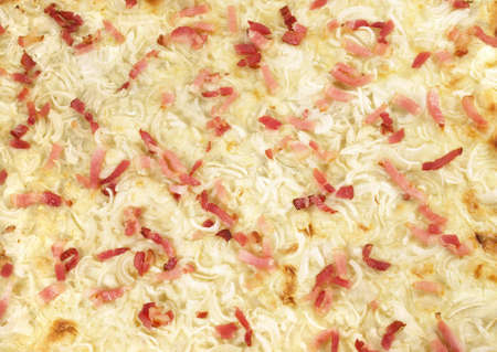 Traditional Tarte Flambee with Creme Fraiche, Onion and Baconの写真素材