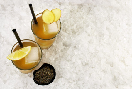 Green Ice Tea with Ginger Root on Ice isolated on white background - Panoramaの写真素材