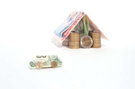 money for car and house idea on white screen backgroundの写真素材