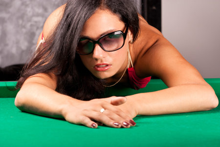 Seductive young woman in sun glasses