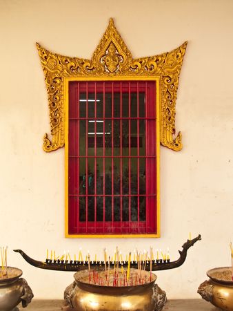 Window on temple wall Bang Khlan Temple, Phichit,Thailandの写真素材