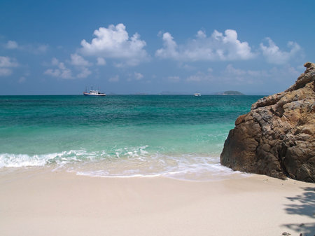 Beautiful beach with emerald color sea in Ko Kham island, Sattahip, Chon Buri, Thailand