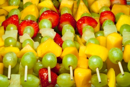 Macro detail of fruit chunks on skewerの写真素材